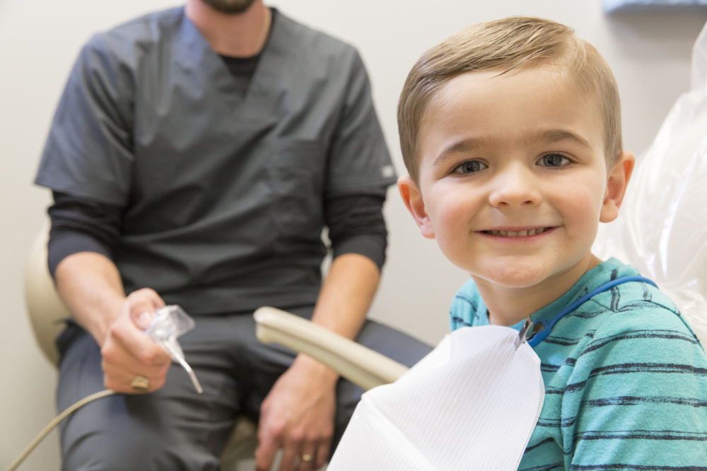 A smiling young patient